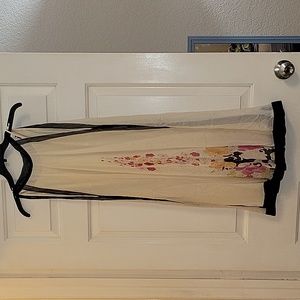 Halter dress size small cream with black trim and flower pattern